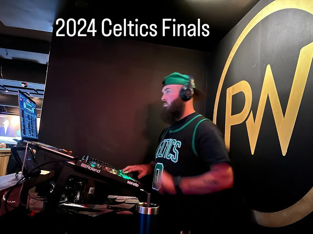 Kyle DJing at a bar during the 2024 Celtics Finals