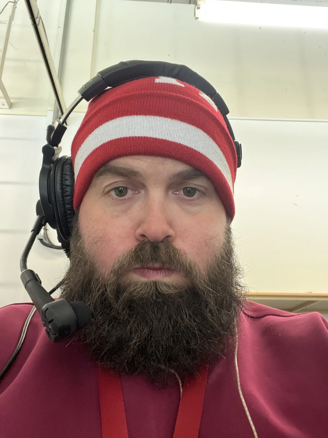 Kyle wearing his game-day headset behind the scenes