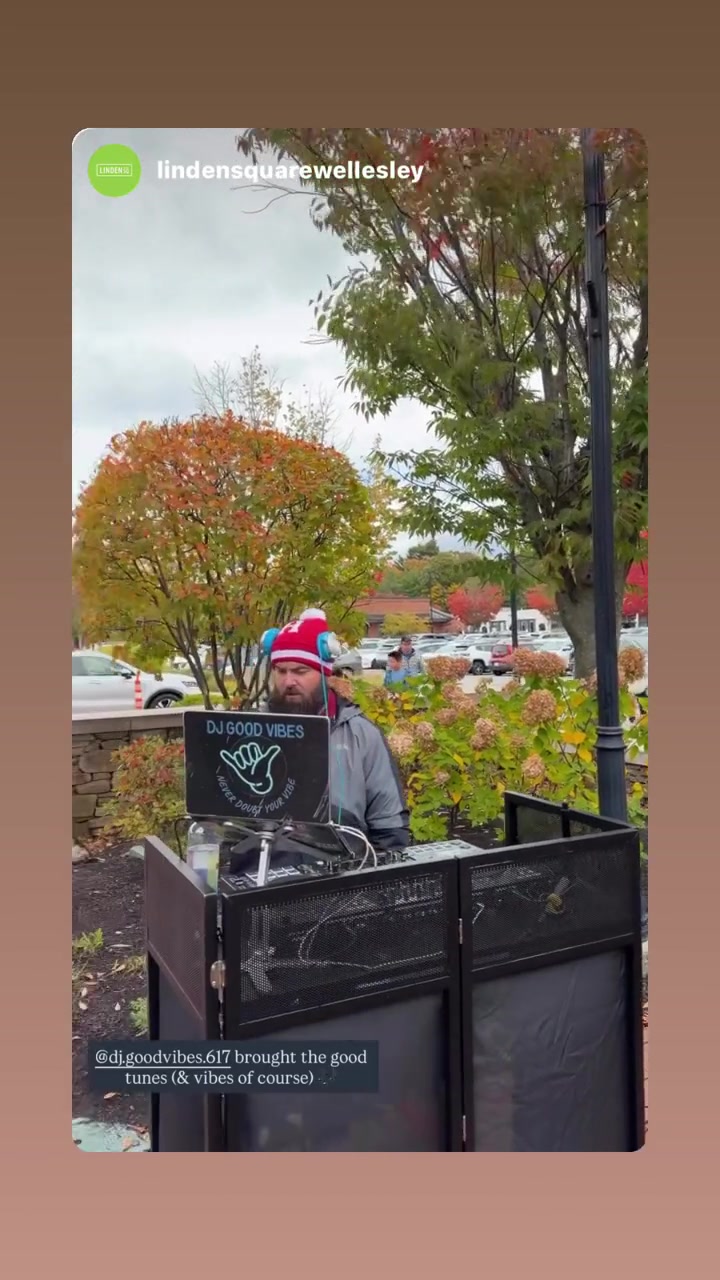 Kyle at the DJ decks at a Halloween community event