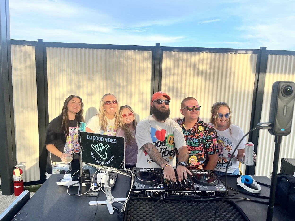 Kyle at the DJ decks with a group of Xfinity Center guests on the Hilary Duff concert day